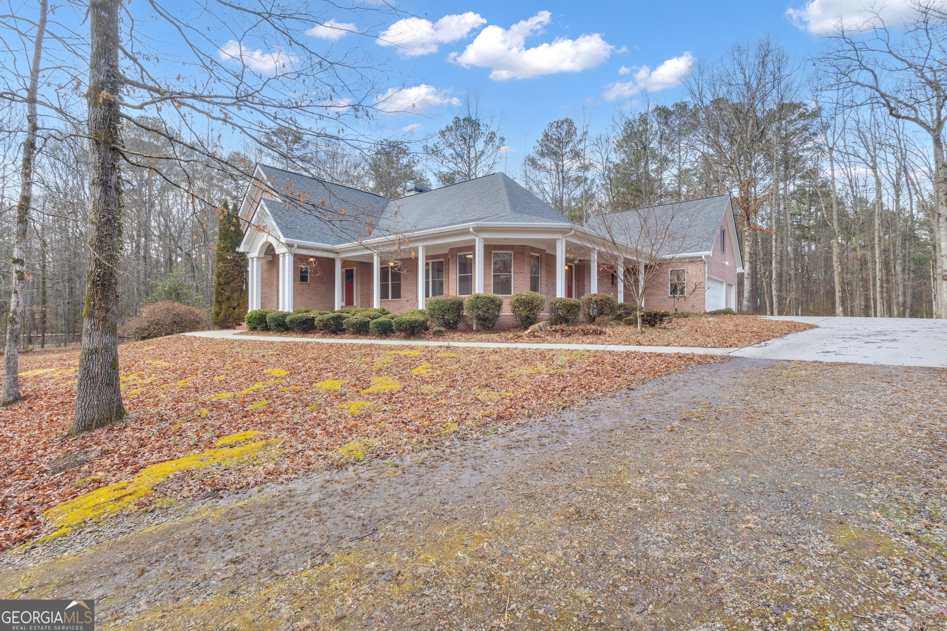155 Rising Star Road Fayetteville, GA 30215 - Photo 3 of 89 a front view of residential houses with yard and trees