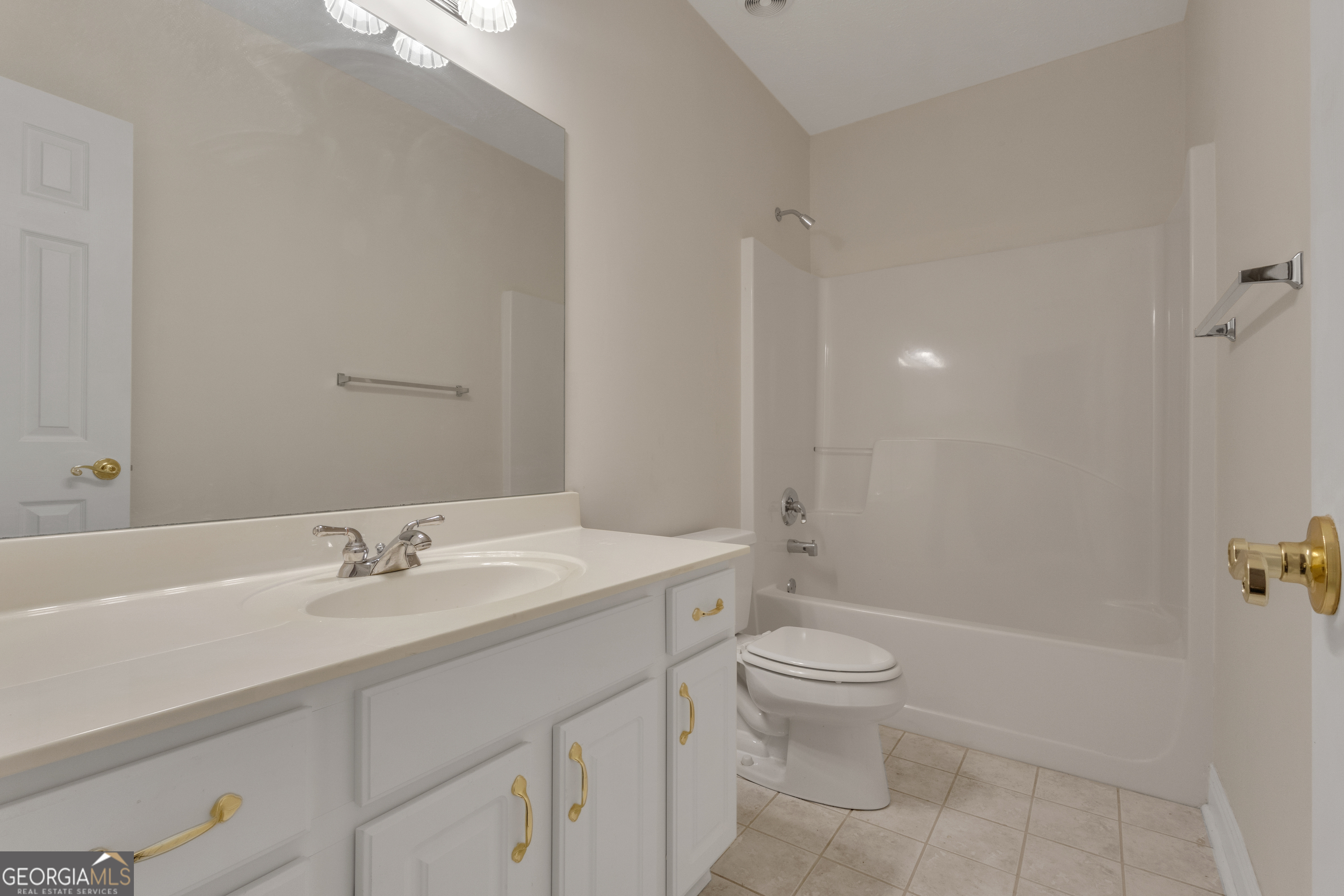 155 Rising Star Road Fayetteville, GA 30215 - Photo 57 of 89 a bathroom with a sink a toilet and shower