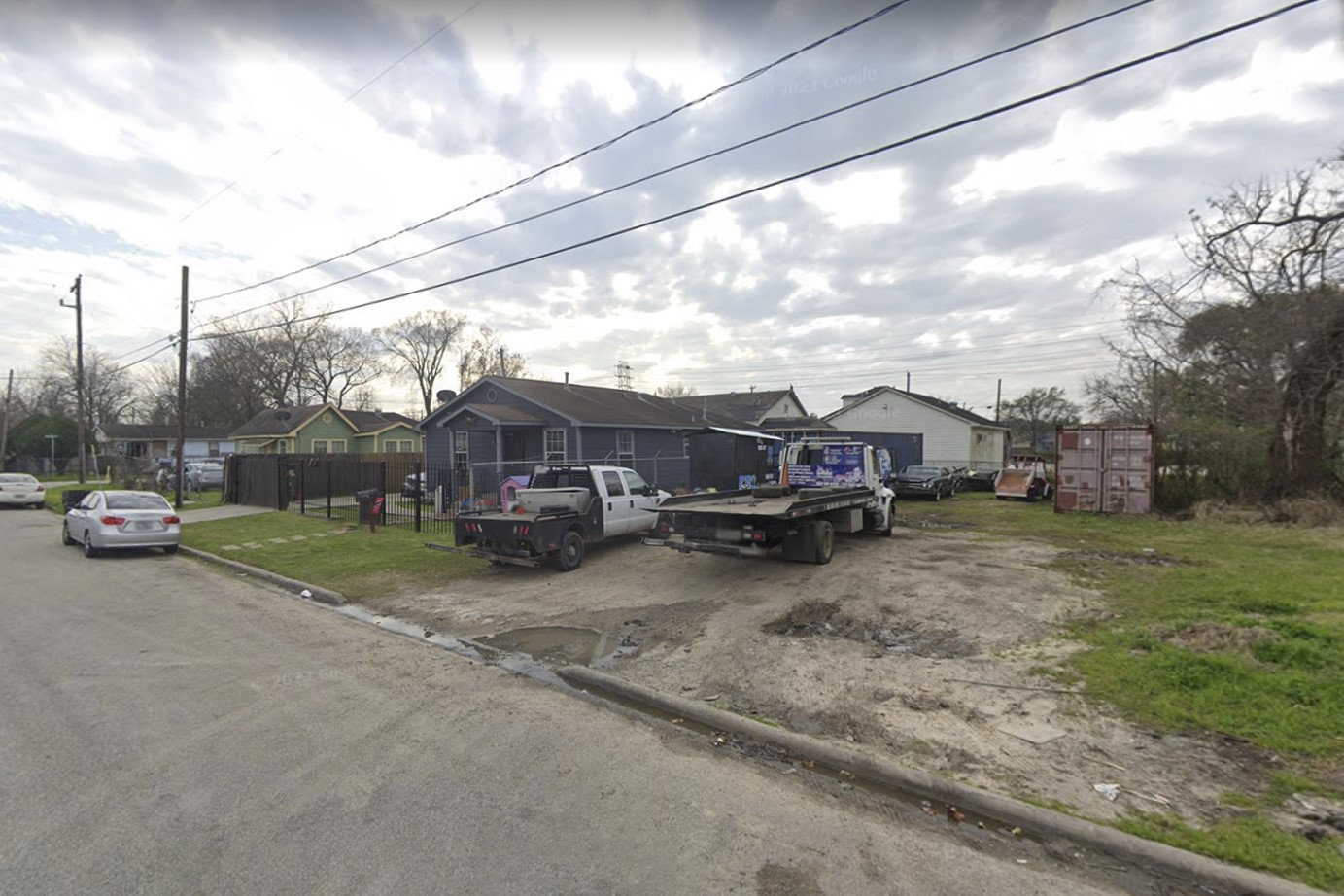 3909 Maury Street Houston, TX 77009 - Photo 2 of 4 a car parked in front of a house