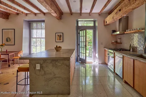 a kitchen with stainless steel appliances granite countertop a stove a sink dishwasher and cabinets