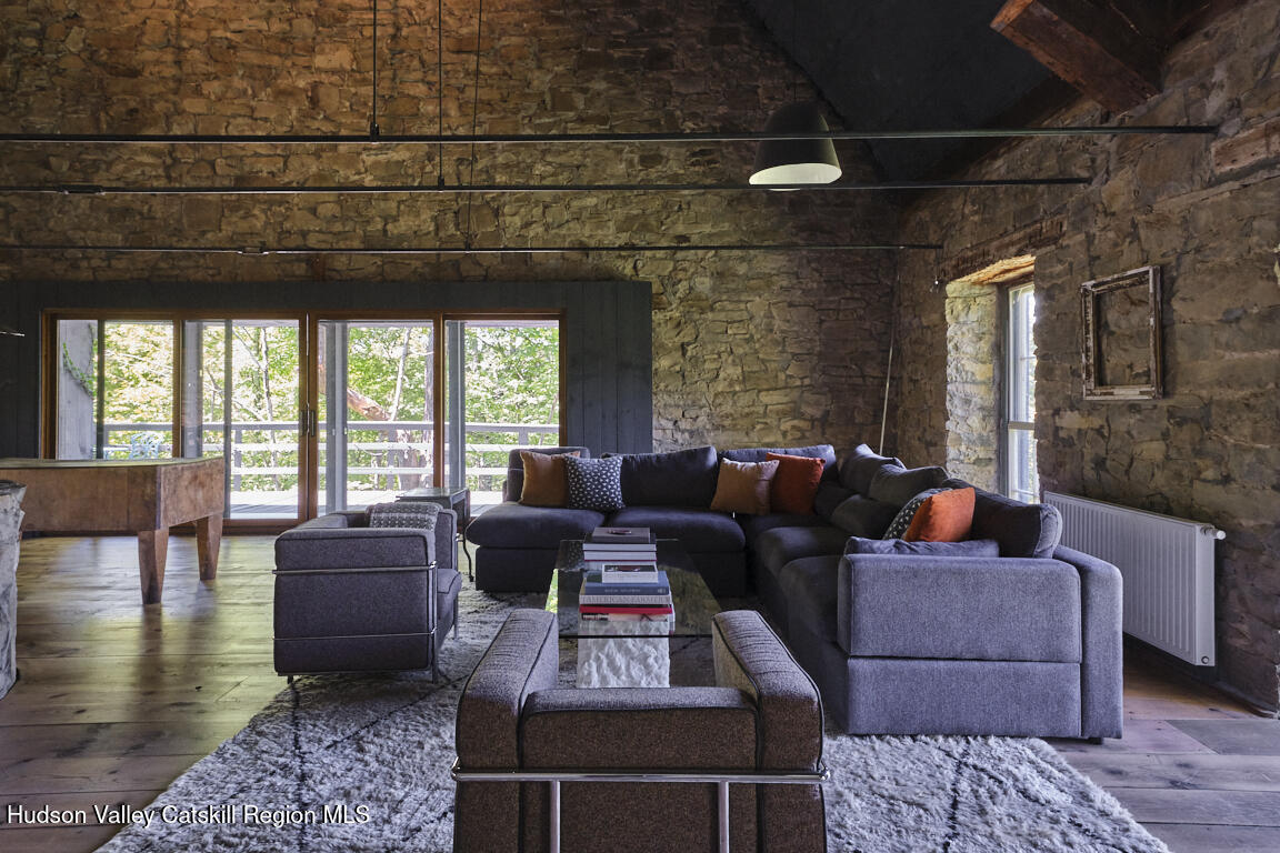 1883 Highway 213 Rifton, NY 12471 - Photo 27 of 46 a living room with furniture and a large window