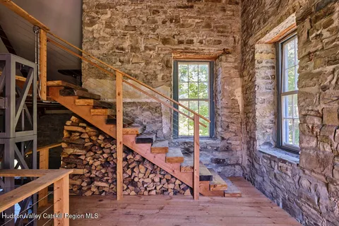 a view of entryway with a front door