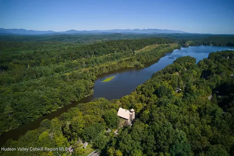 a view of lake with mountain in background