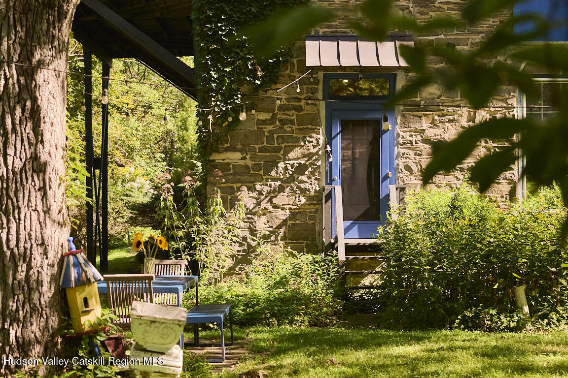 1883 Highway 213 Rifton, NY 12471 - Photo 7 of 46 a front view of a house with a yard