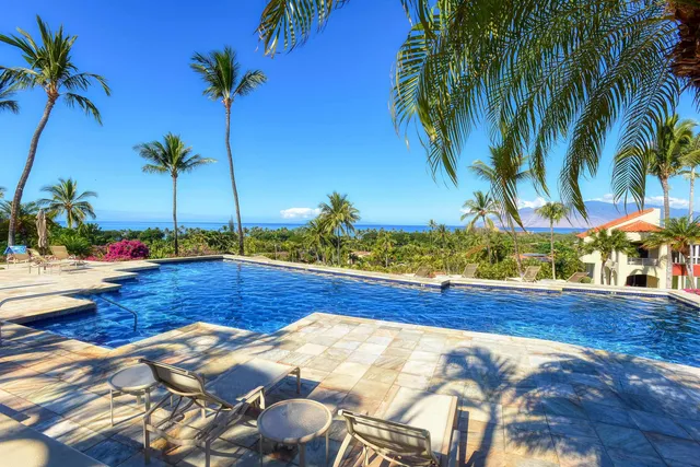 a view of a backyard of a house