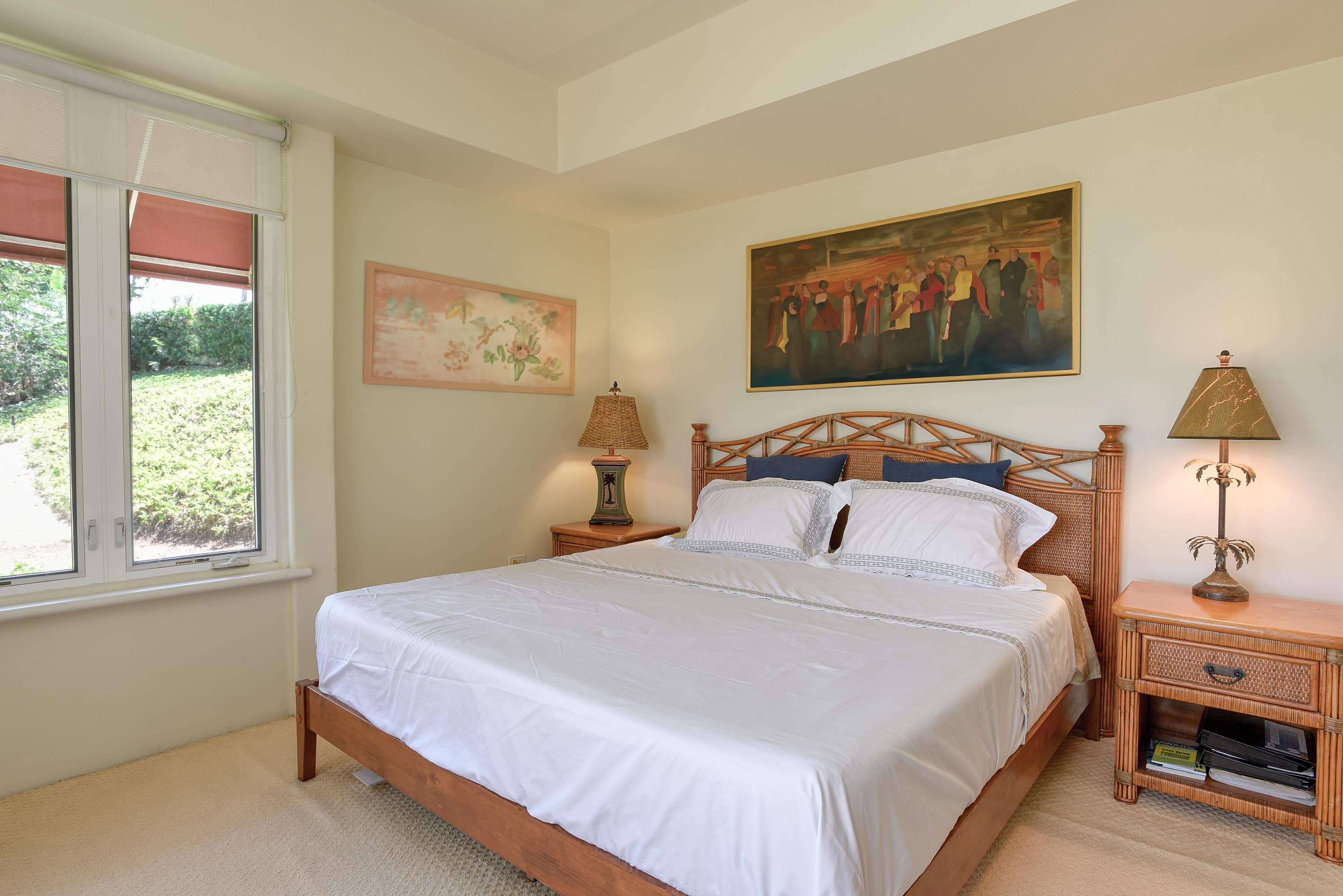 3150 Wailea Alanui Drive, Unit 3807 Kihei, HI 96753 - Photo 13 of 34 a bedroom with a bed and a lamp on dresser next to a window