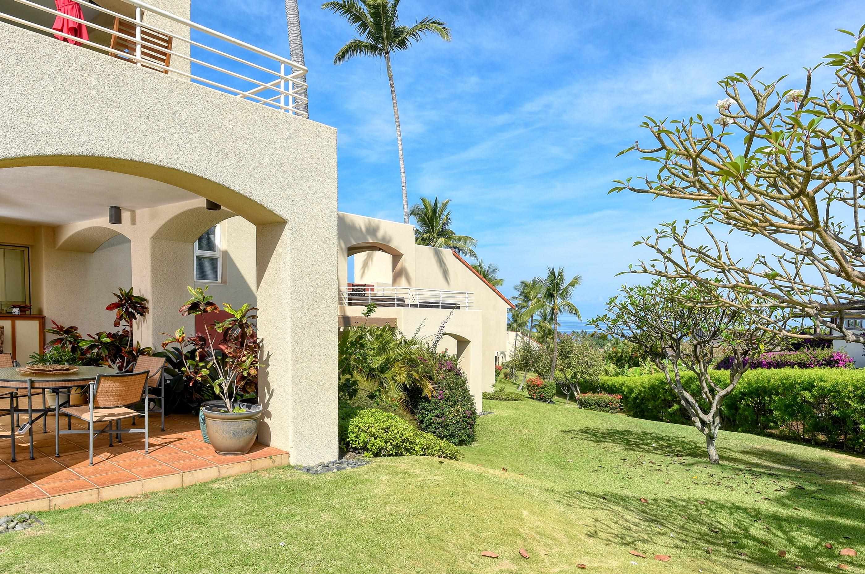 3150 Wailea Alanui Drive, Unit 3807 Kihei, HI 96753 - Photo 17 of 34 a view of a house with a yard