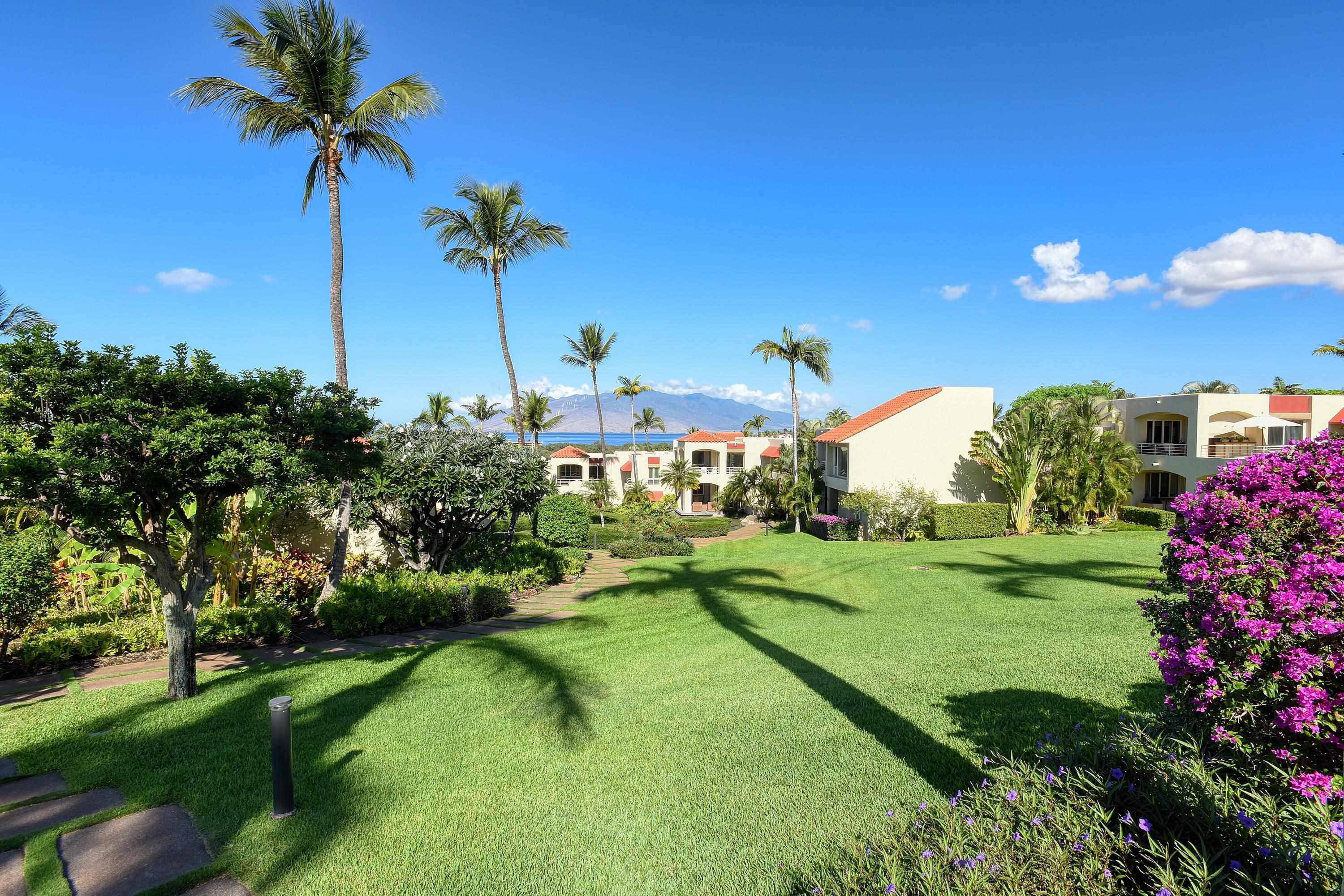 3150 Wailea Alanui Drive, Unit 3807 Kihei, HI 96753 - Photo 20 of 34 a view of a house with a yard and basketball court