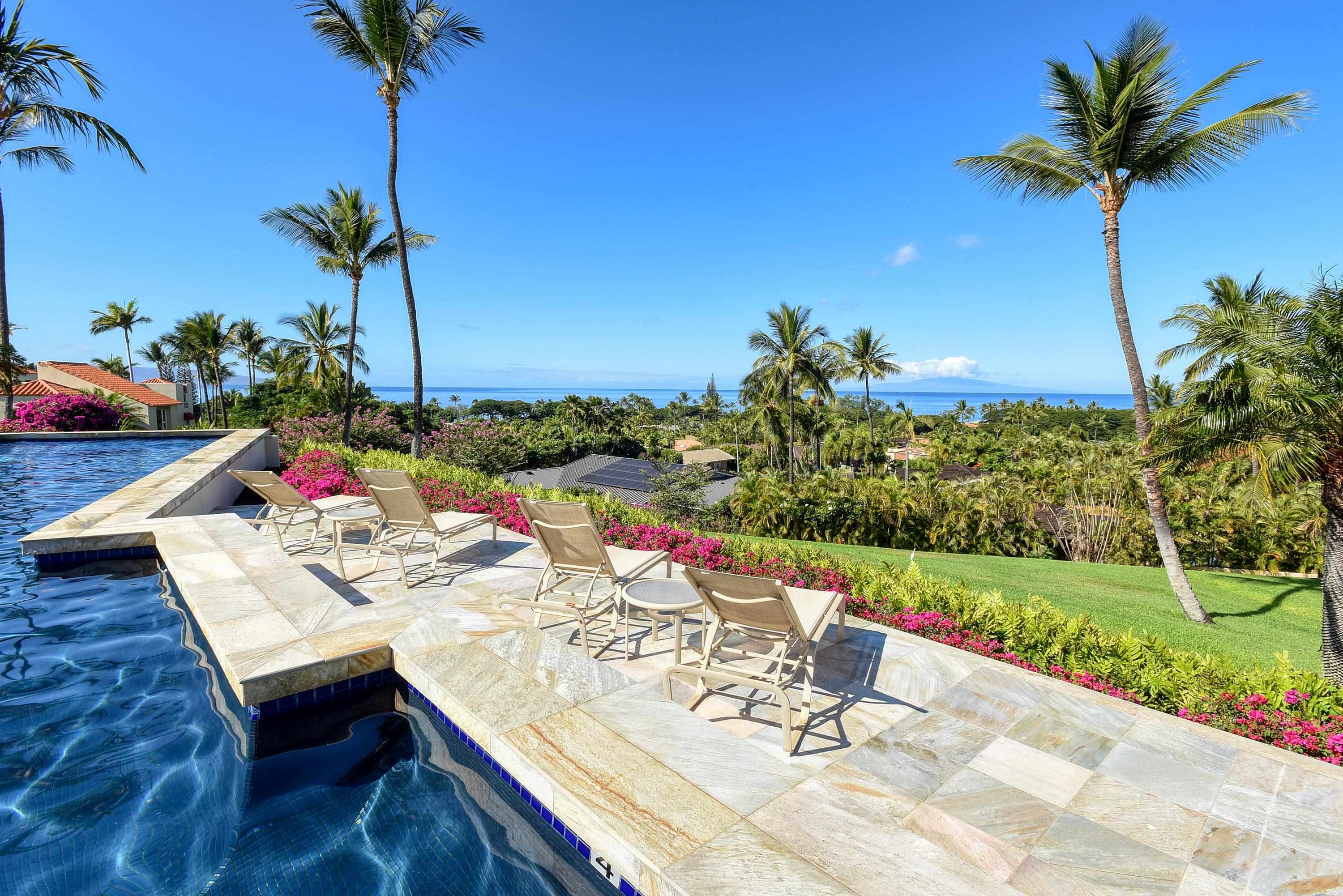 3150 Wailea Alanui Drive, Unit 3807 Kihei, HI 96753 - Photo 22 of 34 a view of a terrace with furniture and garden