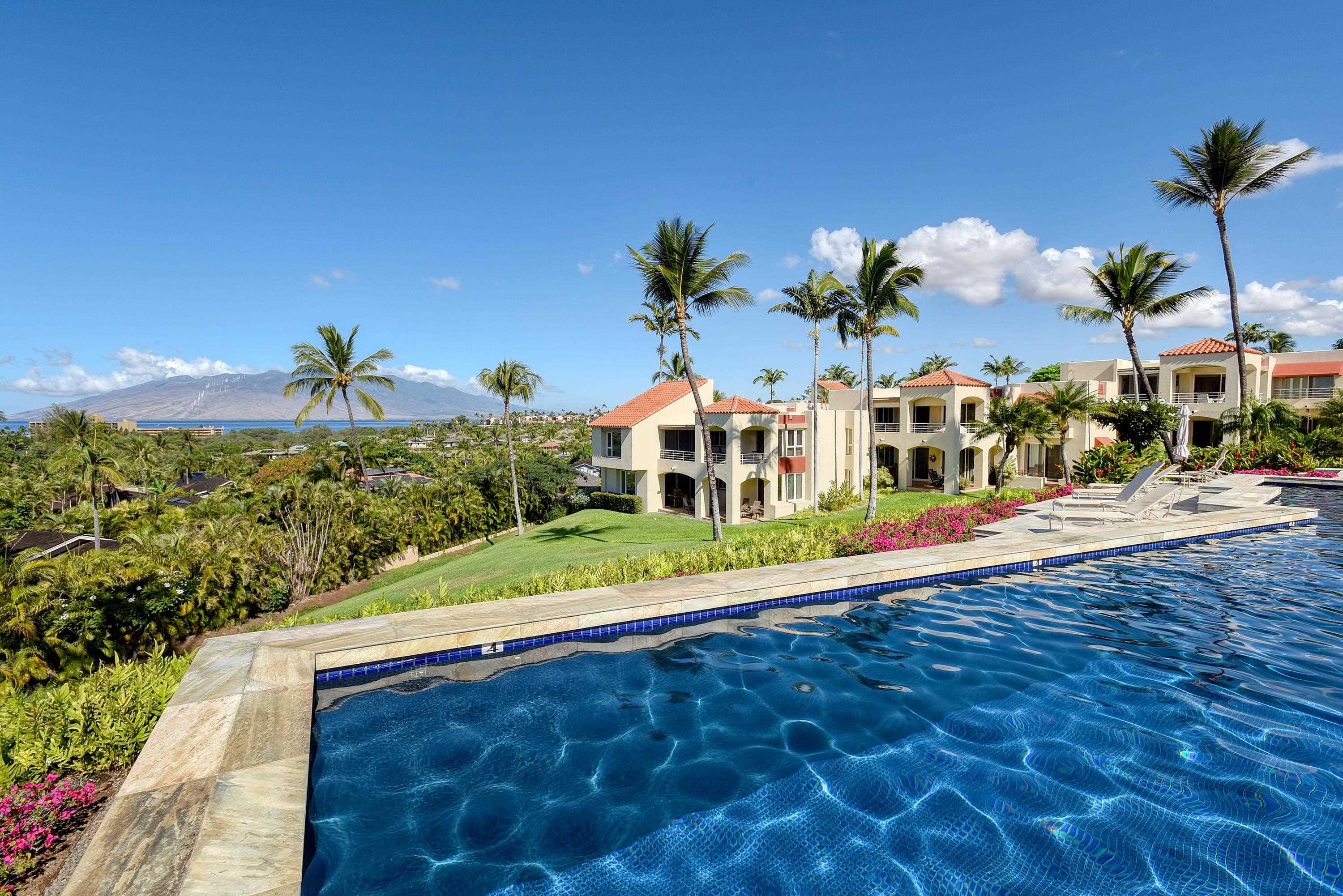 3150 Wailea Alanui Drive, Unit 3807 Kihei, HI 96753 - Photo 23 of 34 a view of a house with a yard
