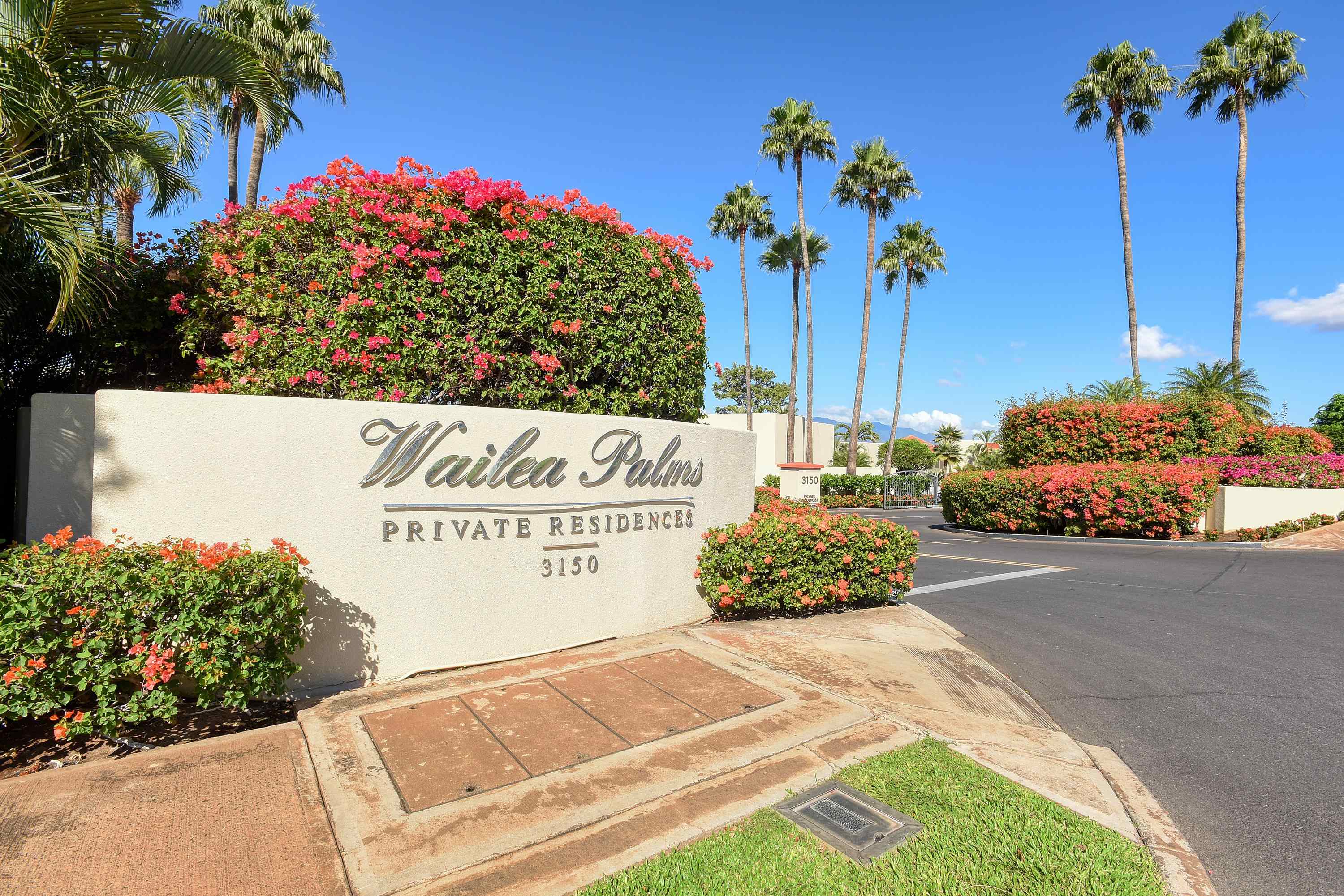 3150 Wailea Alanui Drive, Unit 3807 Kihei, HI 96753 - Photo 28 of 34 a sign on the side of the road