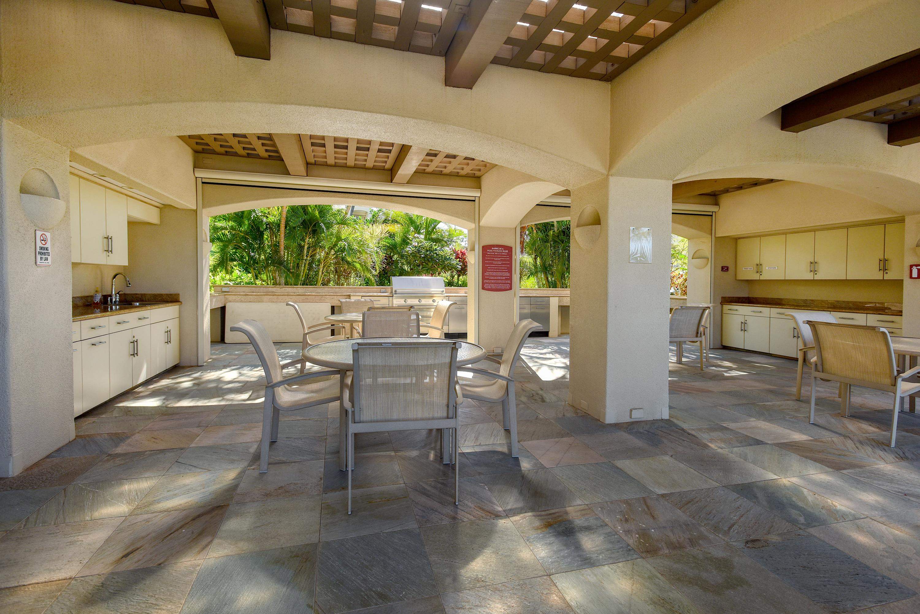 3150 Wailea Alanui Drive, Unit 3807 Kihei, HI 96753 - Photo 31 of 34 a view of a dining area with furniture window and outside view