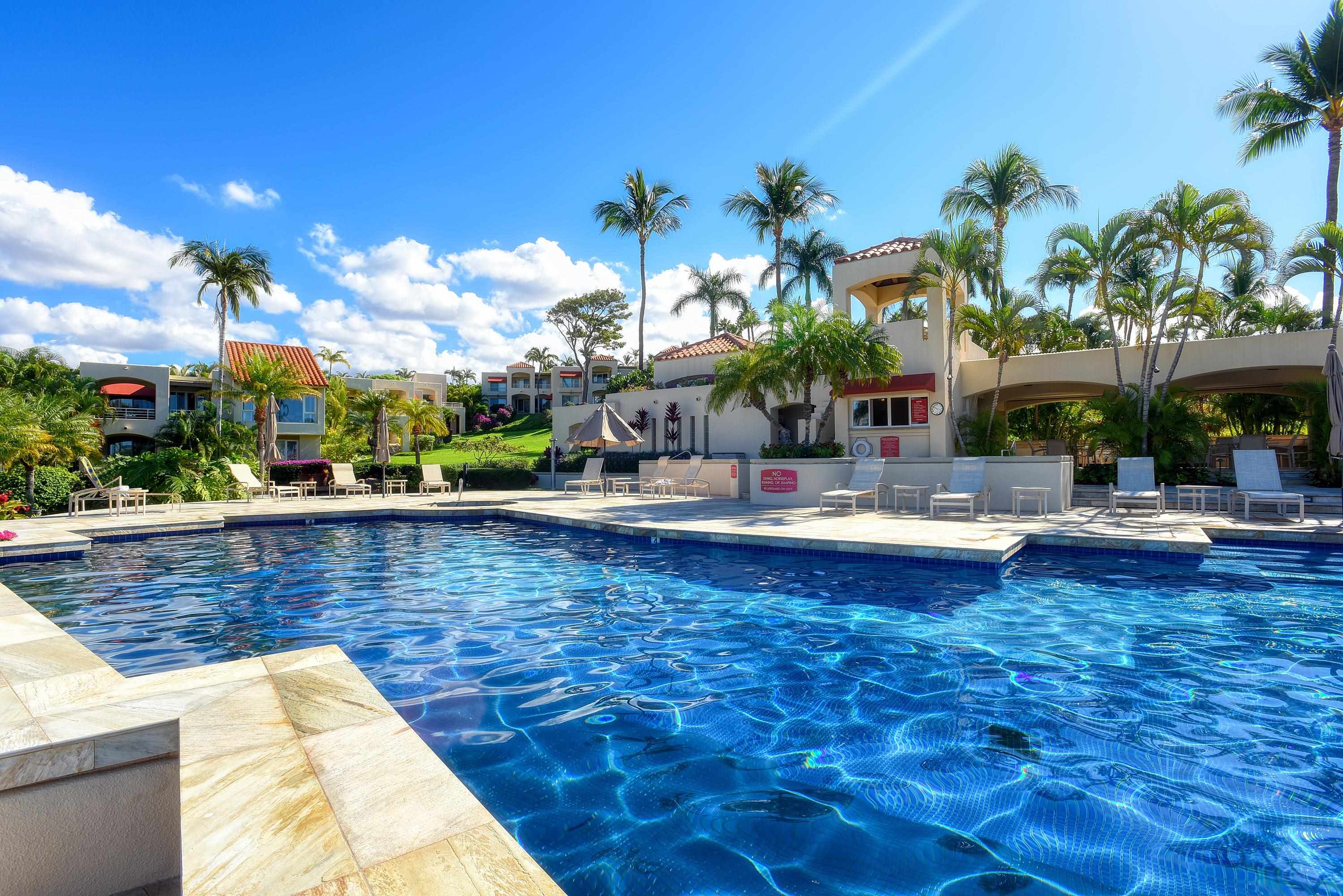 3150 Wailea Alanui Drive, Unit 3807 Kihei, HI 96753 - Photo 9 of 34 a view of swimming pool with outdoor seating and a patio