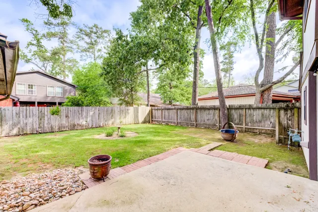 a view of a backyard with a sink and a slide