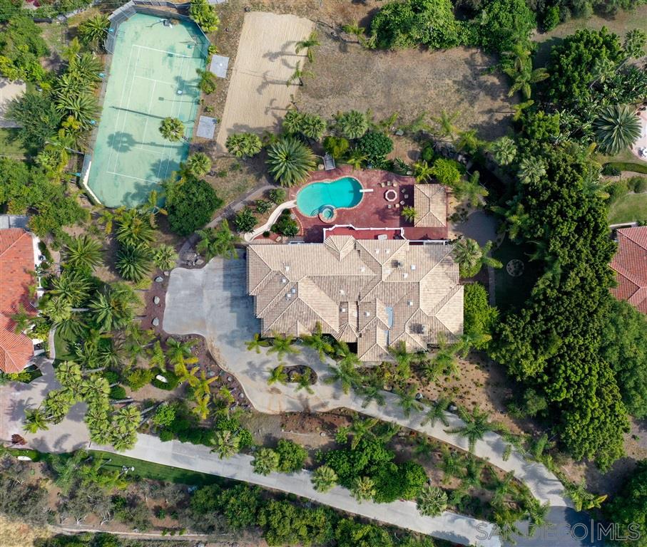7302 Vista Rancho Court Rancho Santa Fe, CA 92091 - Photo 15 of 22 an aerial view of a house with a yard and lake view