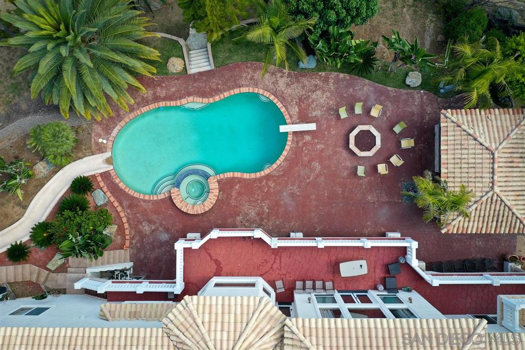 7302 Vista Rancho Court Rancho Santa Fe, CA 92091 - Photo 17 of 22 an outdoor sitting area with golf course