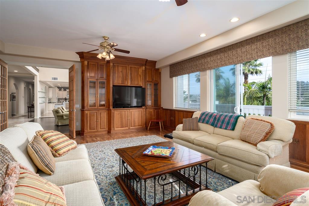 7302 Vista Rancho Court Rancho Santa Fe, CA 92091 - Photo 5 of 22 a living room with furniture and a flat screen tv