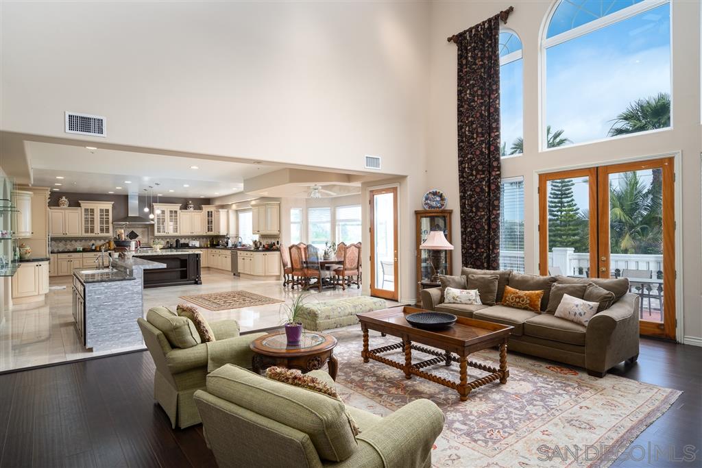 7302 Vista Rancho Court Rancho Santa Fe, CA 92091 - Photo 6 of 22 a living room with furniture and a large window