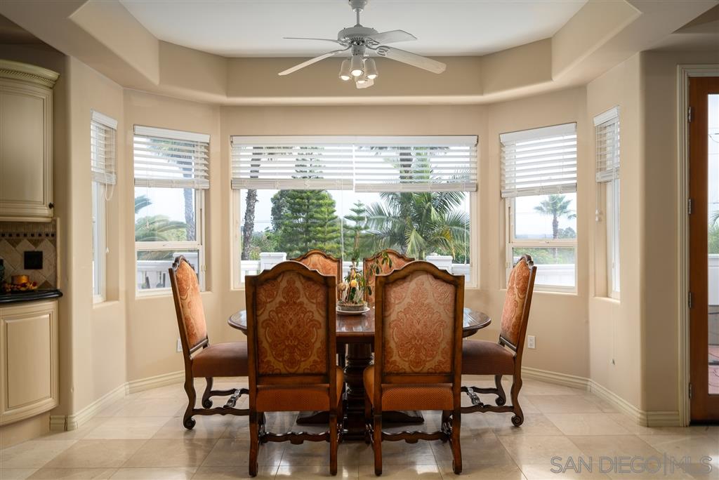 7302 Vista Rancho Court Rancho Santa Fe, CA 92091 - Photo 8 of 22 a view of a dining room with furniture window and outside view
