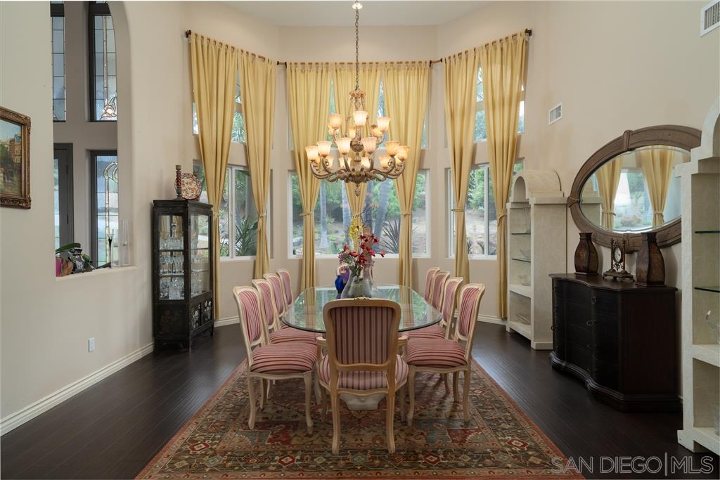 7302 Vista Rancho Court Rancho Santa Fe, CA 92091 - Photo 10 of 22 a dining room with furniture and window