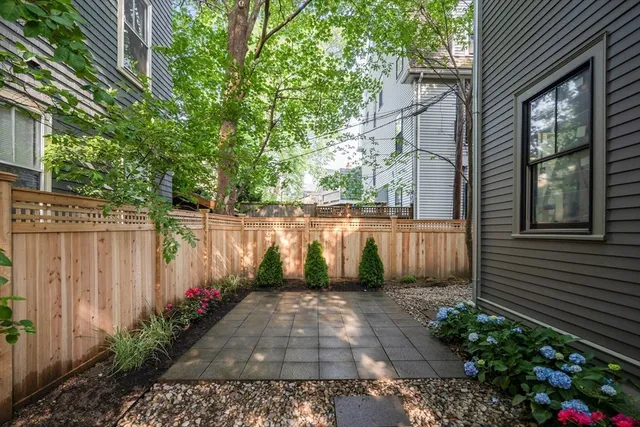 a view of a pathway with a yard