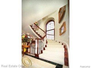 6587 Cornerstone Lane Rochester, MI 48306 - Photo 7 of 20 Wood stairs