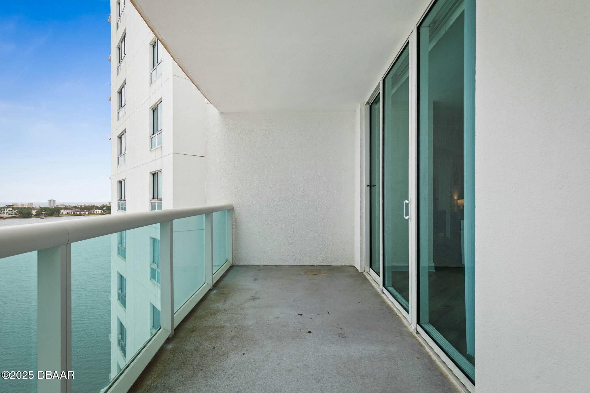 231 Riverside Drive, Unit 1104 Holly Hill, FL 32117 - Photo 11 of 77 a view of an entryway with staircase