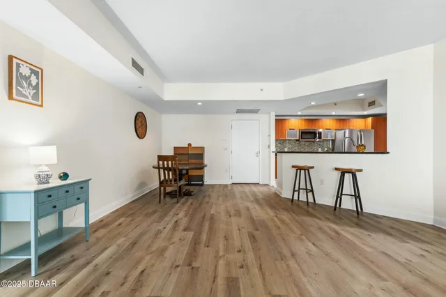 a kitchen with granite countertop a sink and a stove
