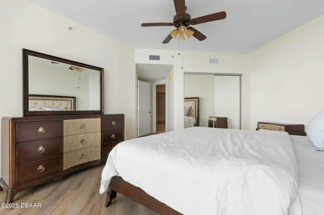 a view of a swimming pool with a lounge chair