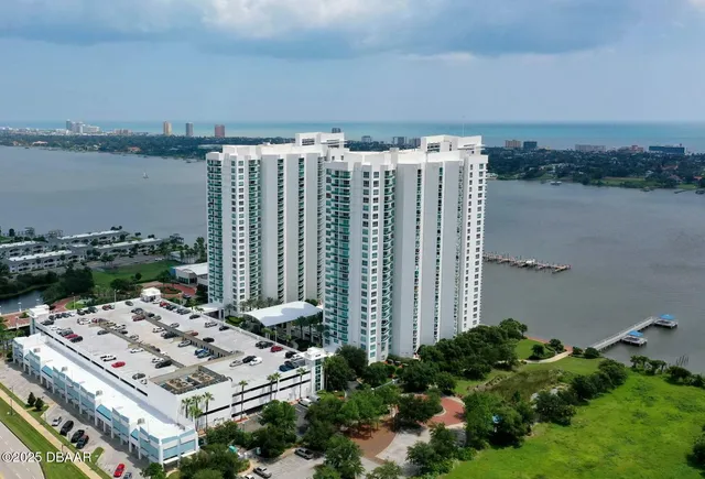 a view of balcony with outdoor space and lake view
