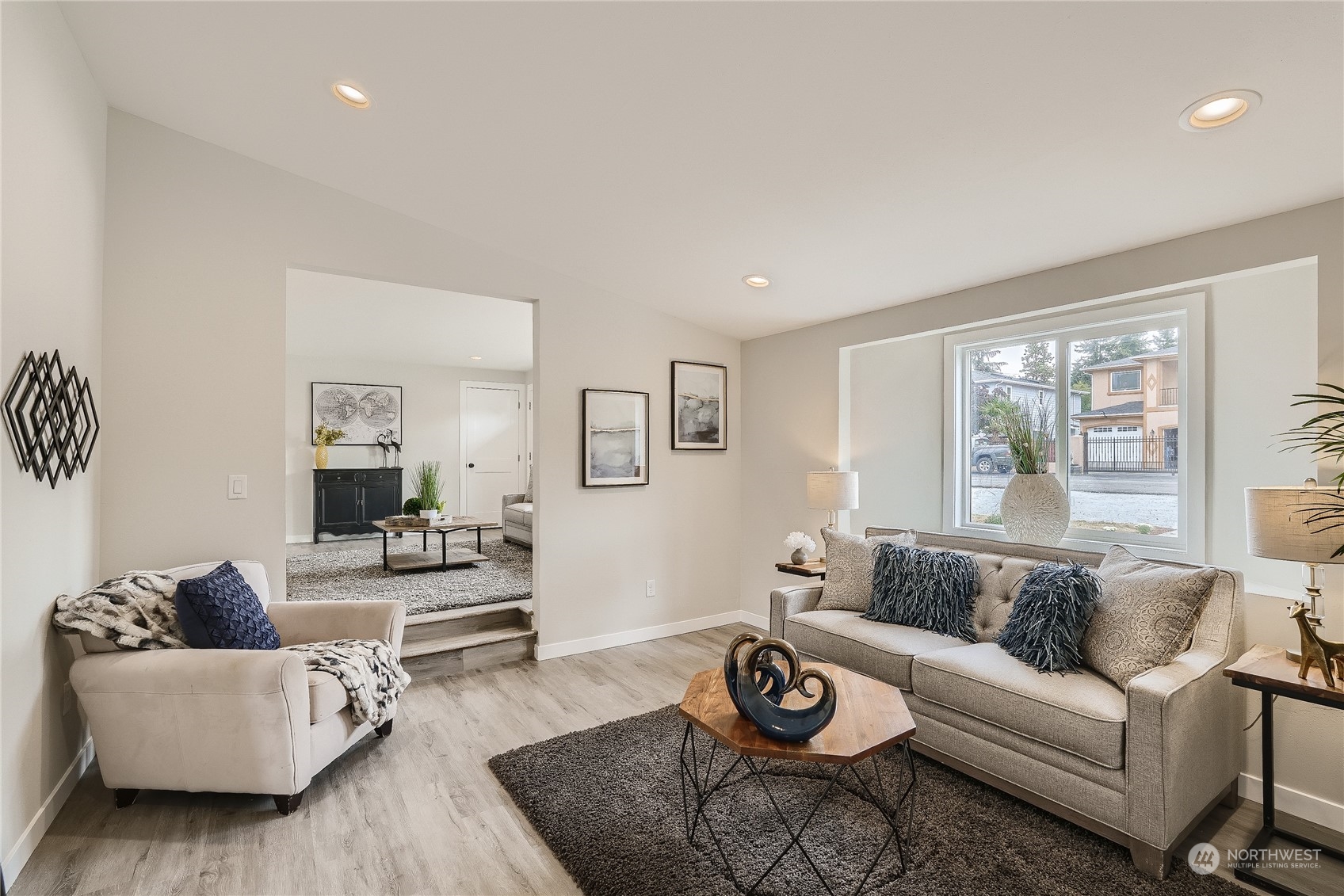 5004 Northeast 7th Place Renton, WA 98059 - Photo 15 of 28 a living room with furniture and wooden floor