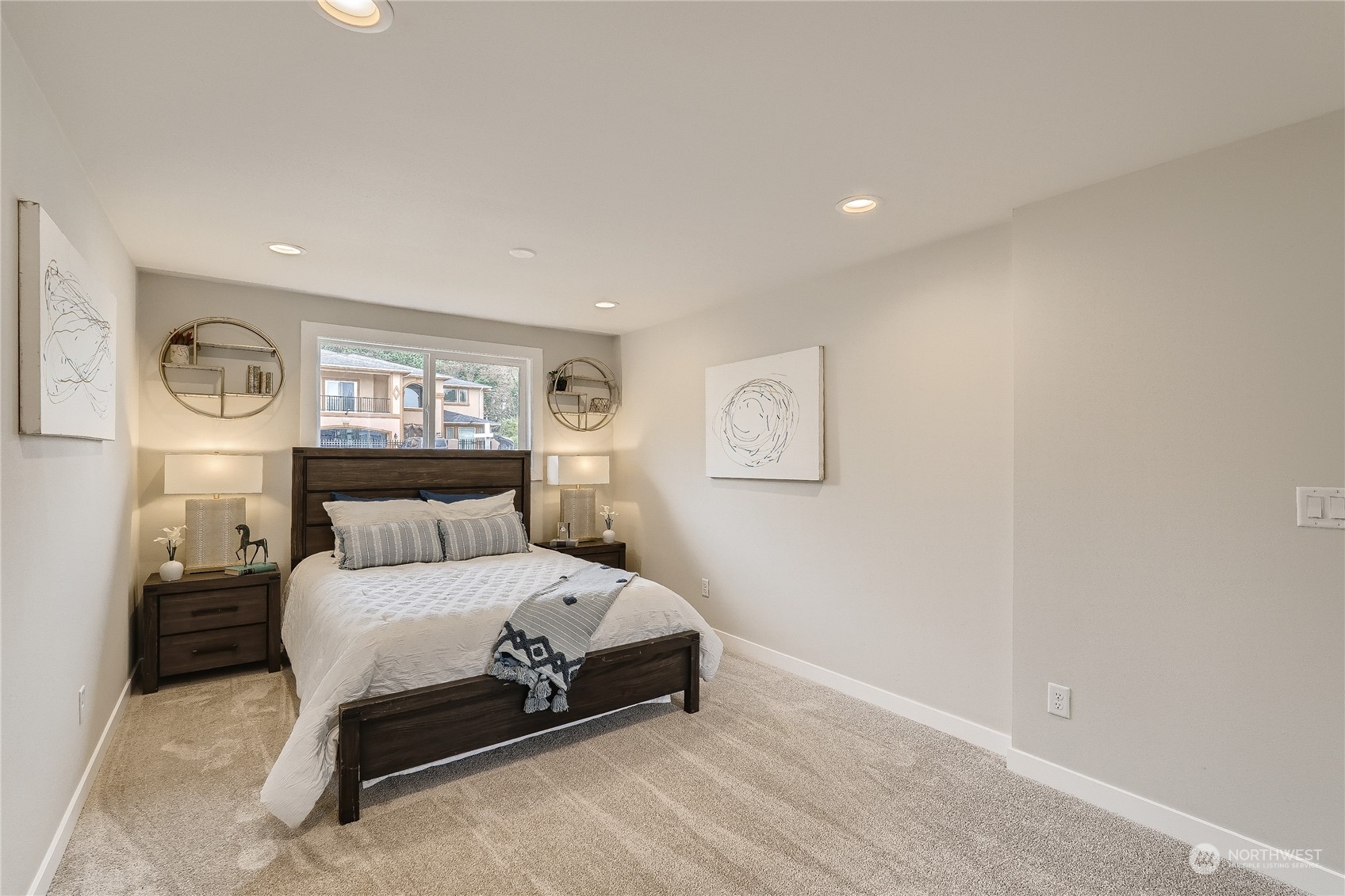 5004 Northeast 7th Place Renton, WA 98059 - Photo 17 of 28 a bedroom with a bed and a night stand
