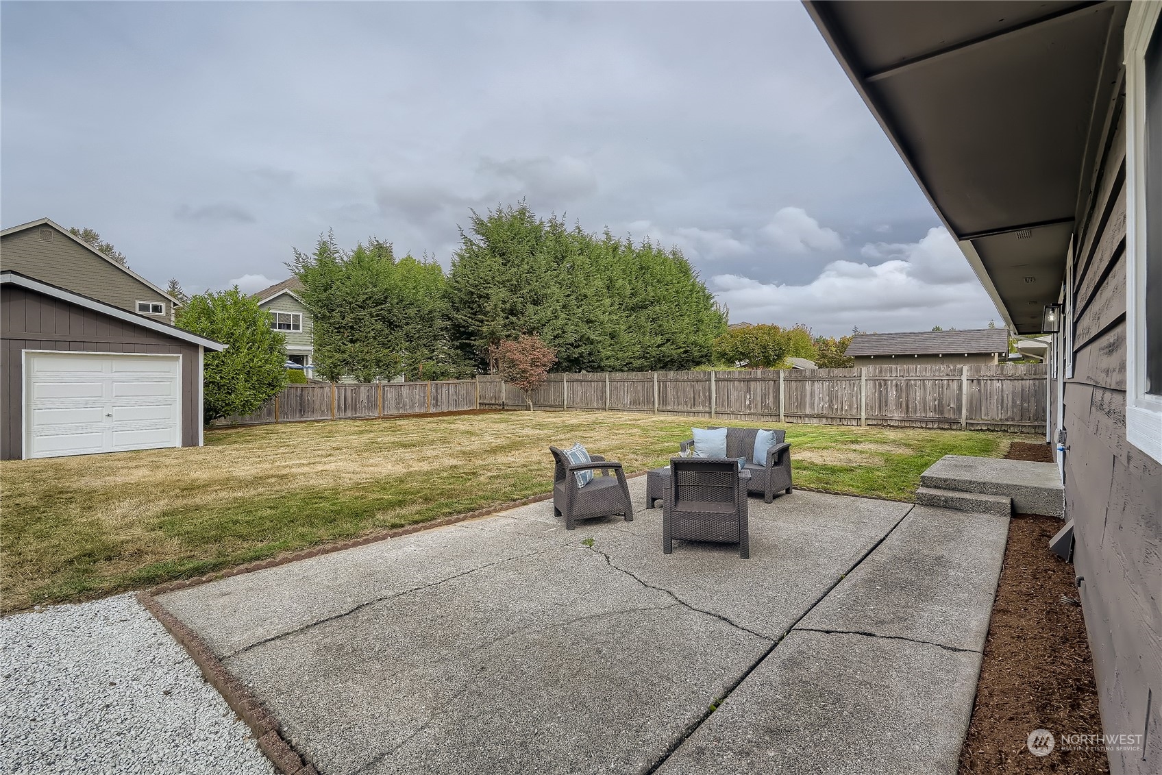 5004 Northeast 7th Place Renton, WA 98059 - Photo 23 of 28 a view of backyard with seating space
