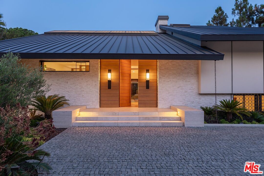 984 North Alpine Drive Beverly Hills, CA 90210 - Photo 2 of 25 a view of swimming pool with an outdoor space and seating area