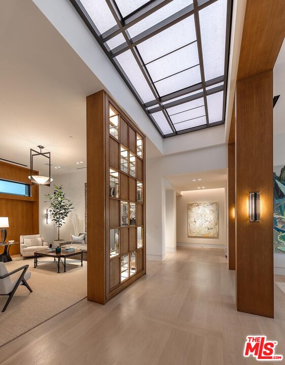 984 North Alpine Drive Beverly Hills, CA 90210 - Photo 3 of 25 a living room with furniture