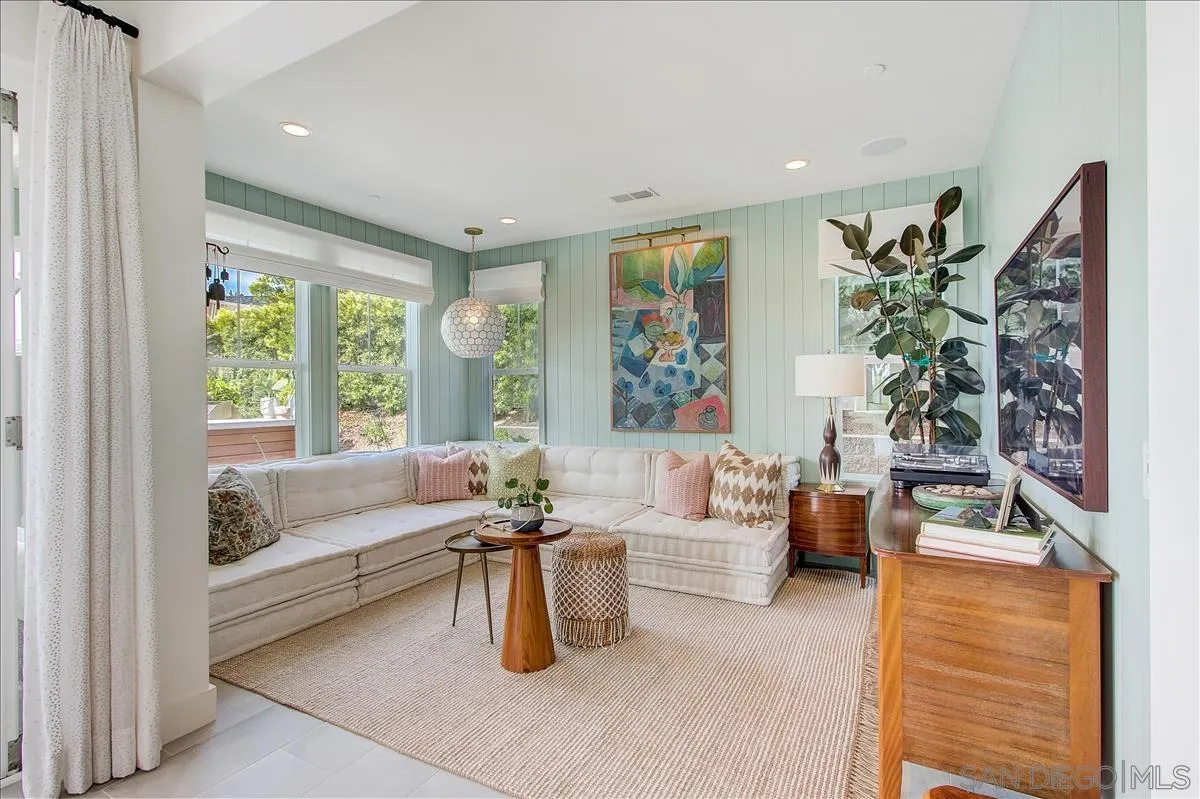 656 Jocelyn Way Encinitas, CA 92024 - Photo 11 of 35 a living room with furniture and a large window