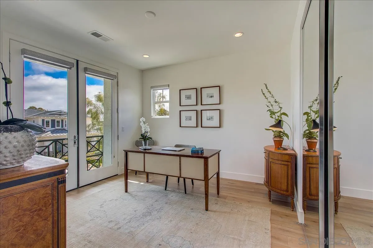 656 Jocelyn Way Encinitas, CA 92024 - Photo 20 of 35 a living room with furniture and a window