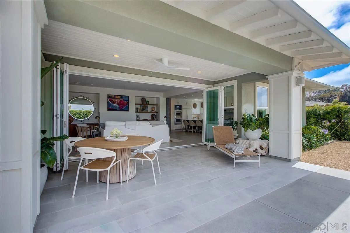 656 Jocelyn Way Encinitas, CA 92024 - Photo 28 of 35 a dining room with furniture and wooden floor