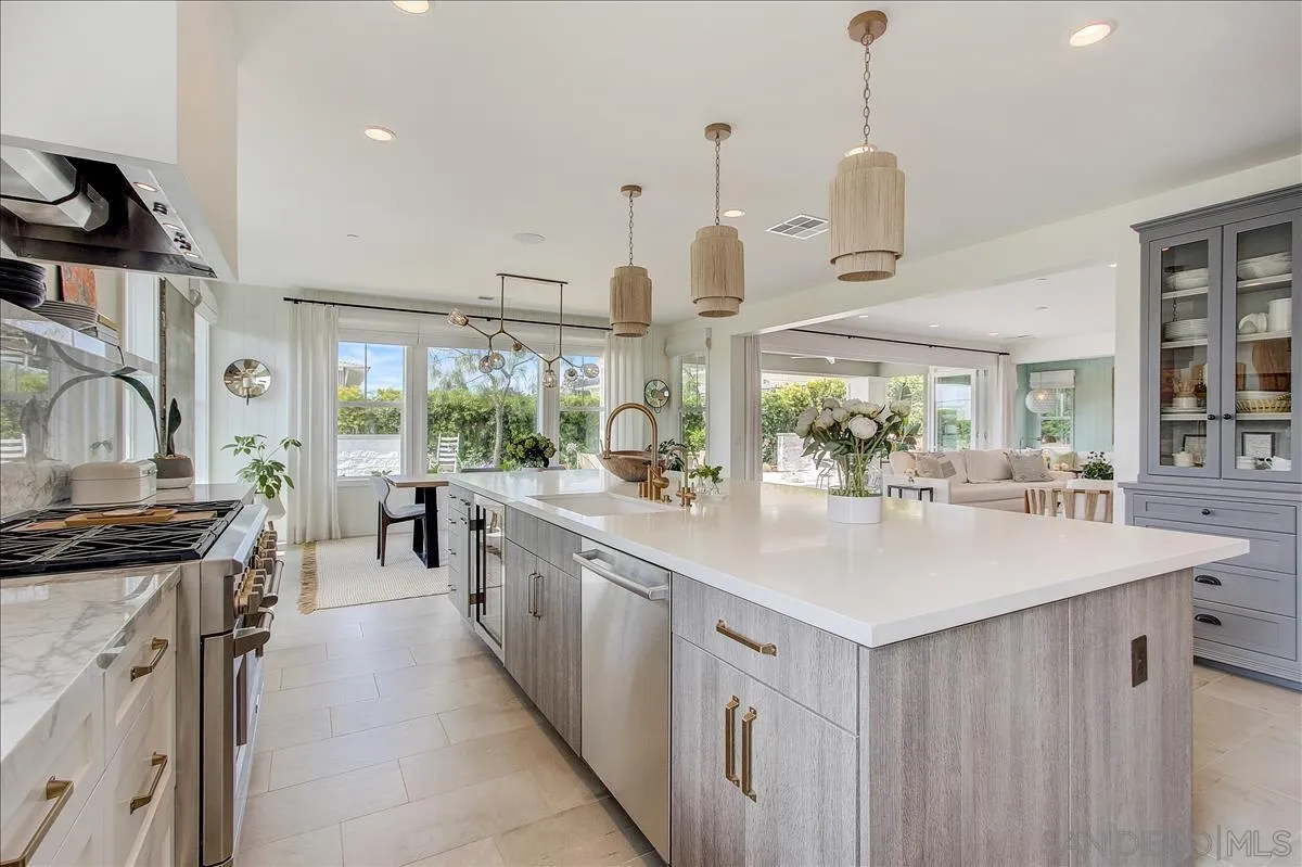 656 Jocelyn Way Encinitas, CA 92024 - Photo 3 of 35 a kitchen with sink stove and cabinets