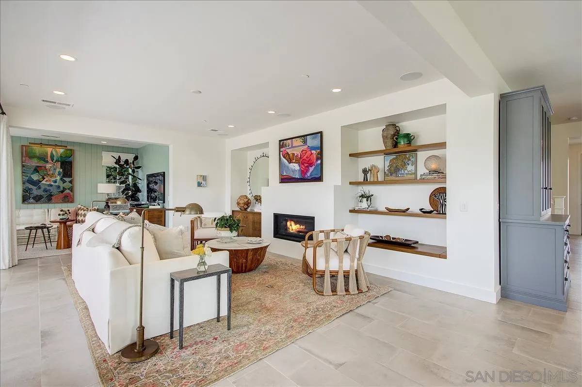 656 Jocelyn Way Encinitas, CA 92024 - Photo 10 of 35 a living room with furniture and a kitchen view