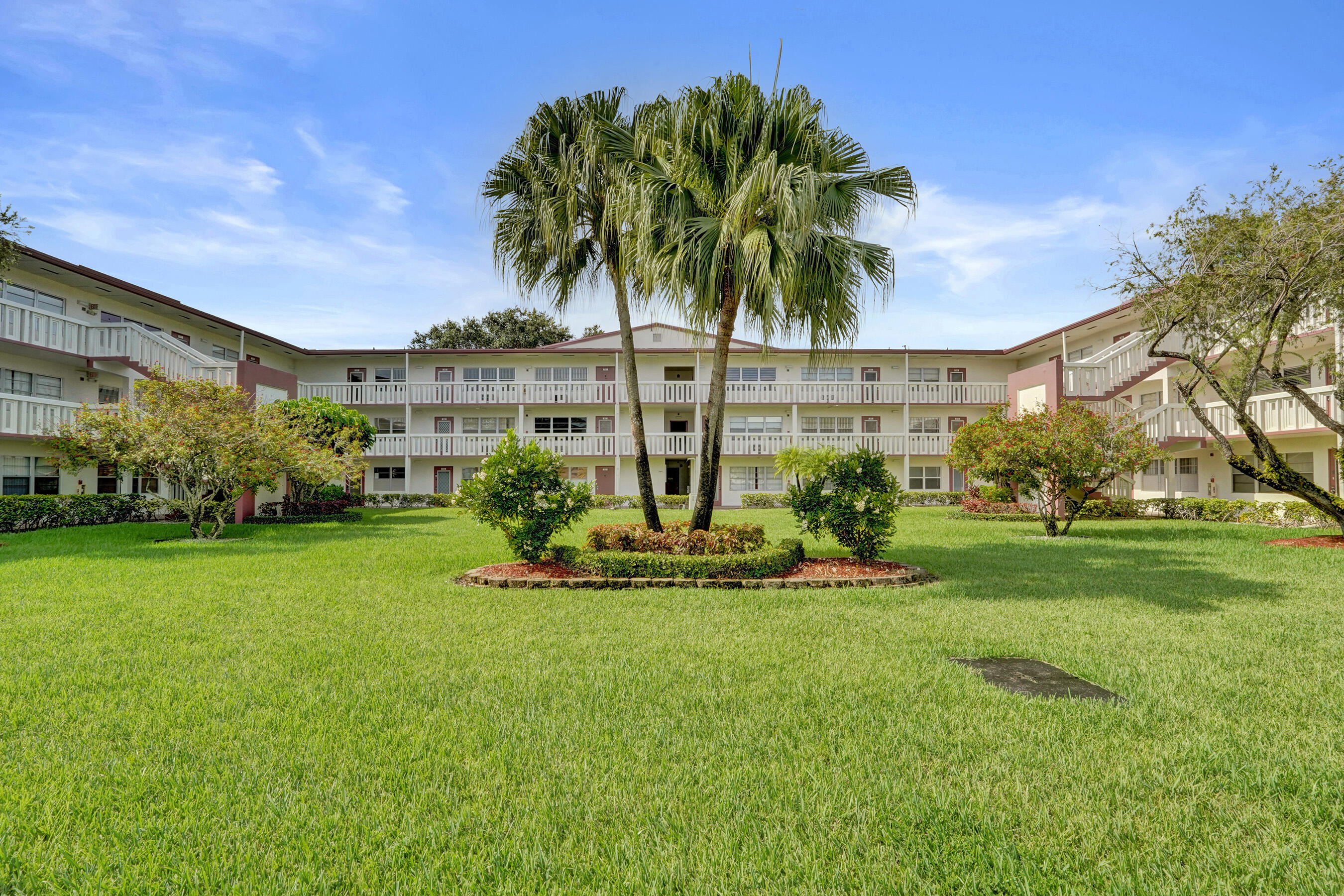 566 Fanshaw North Boca Raton, FL 33434 - Photo 2 of 27 Front of Building