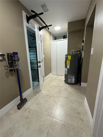 a kitchen with a sink and a stove