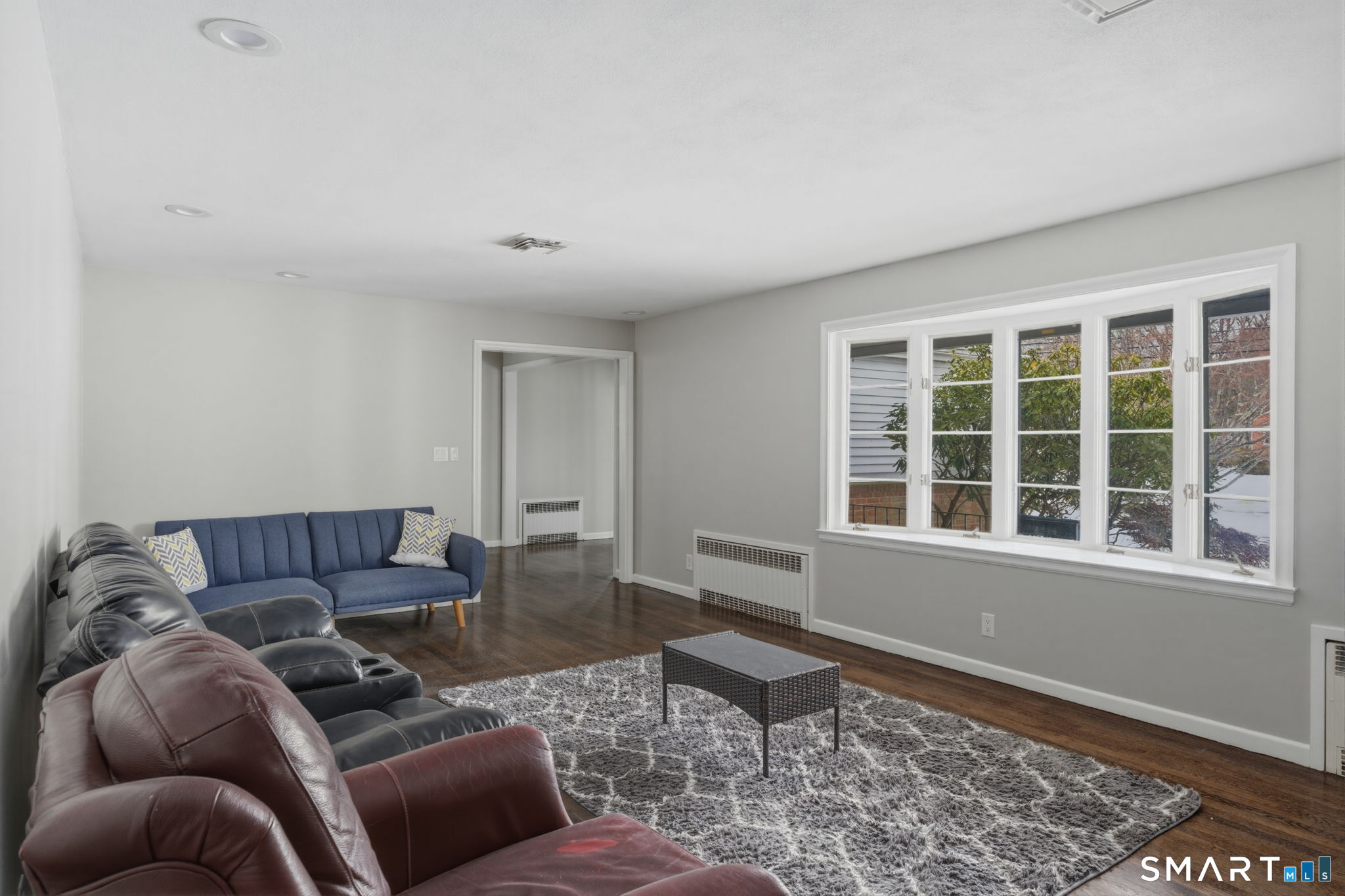 35 West Ridge Drive West Hartford, CT 06117 - Photo 11 of 38 a living room with furniture and a window