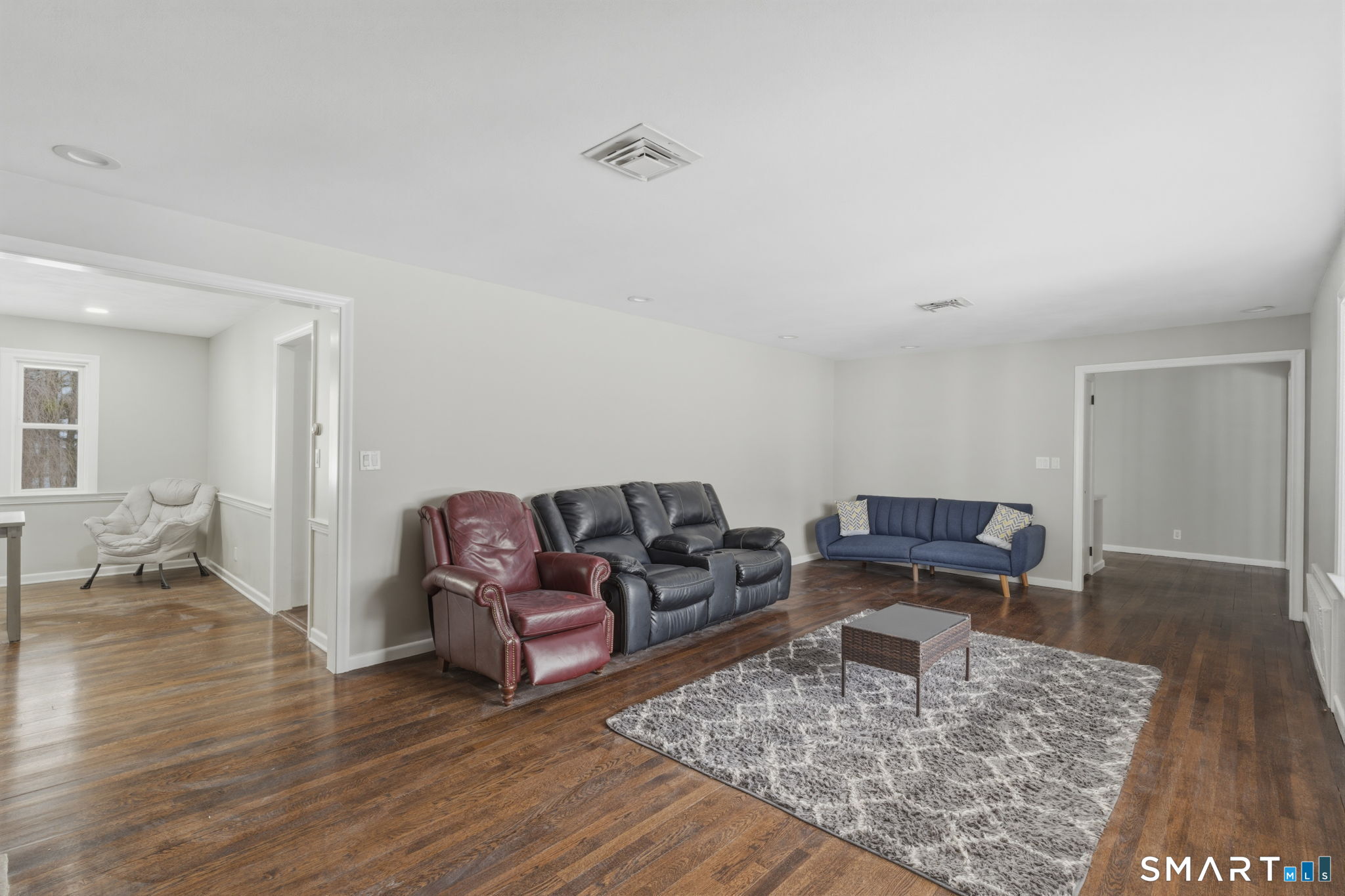 35 West Ridge Drive West Hartford, CT 06117 - Photo 13 of 38 a living room with furniture and wooden floor