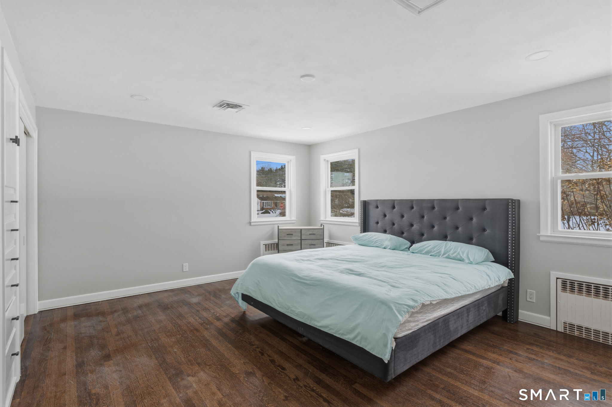 35 West Ridge Drive West Hartford, CT 06117 - Photo 17 of 38 a large bedroom with a bed and window