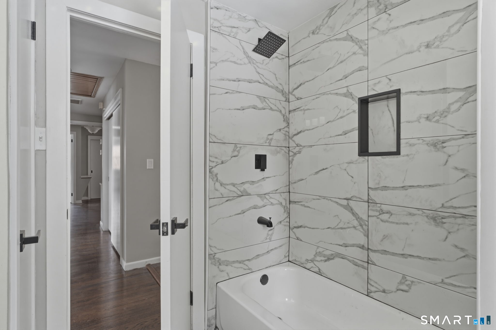 35 West Ridge Drive West Hartford, CT 06117 - Photo 23 of 38 a bathroom with a bathtub and a shower