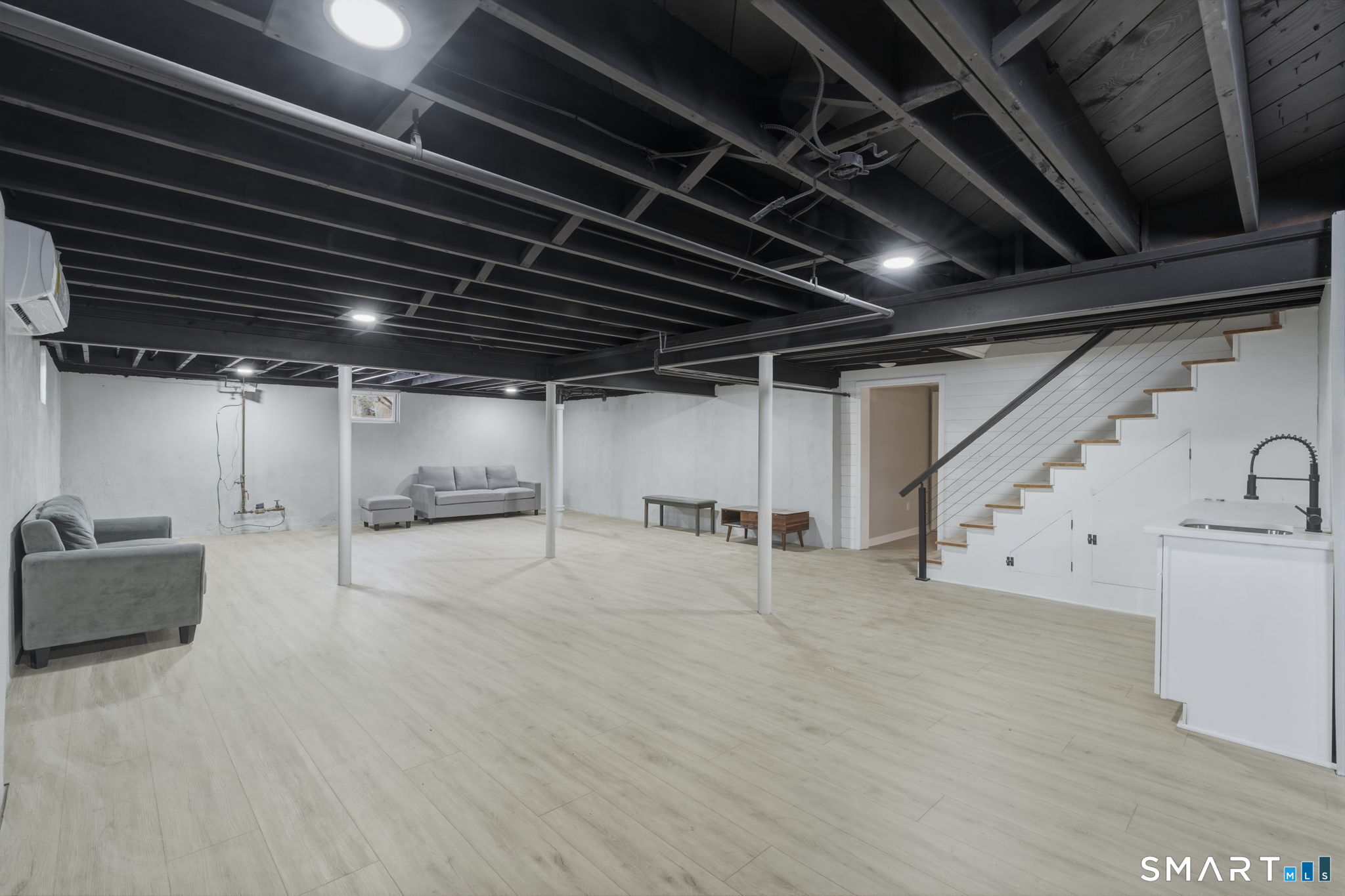 35 West Ridge Drive West Hartford, CT 06117 - Photo 28 of 38 a view of an empty room with wooden ceiling