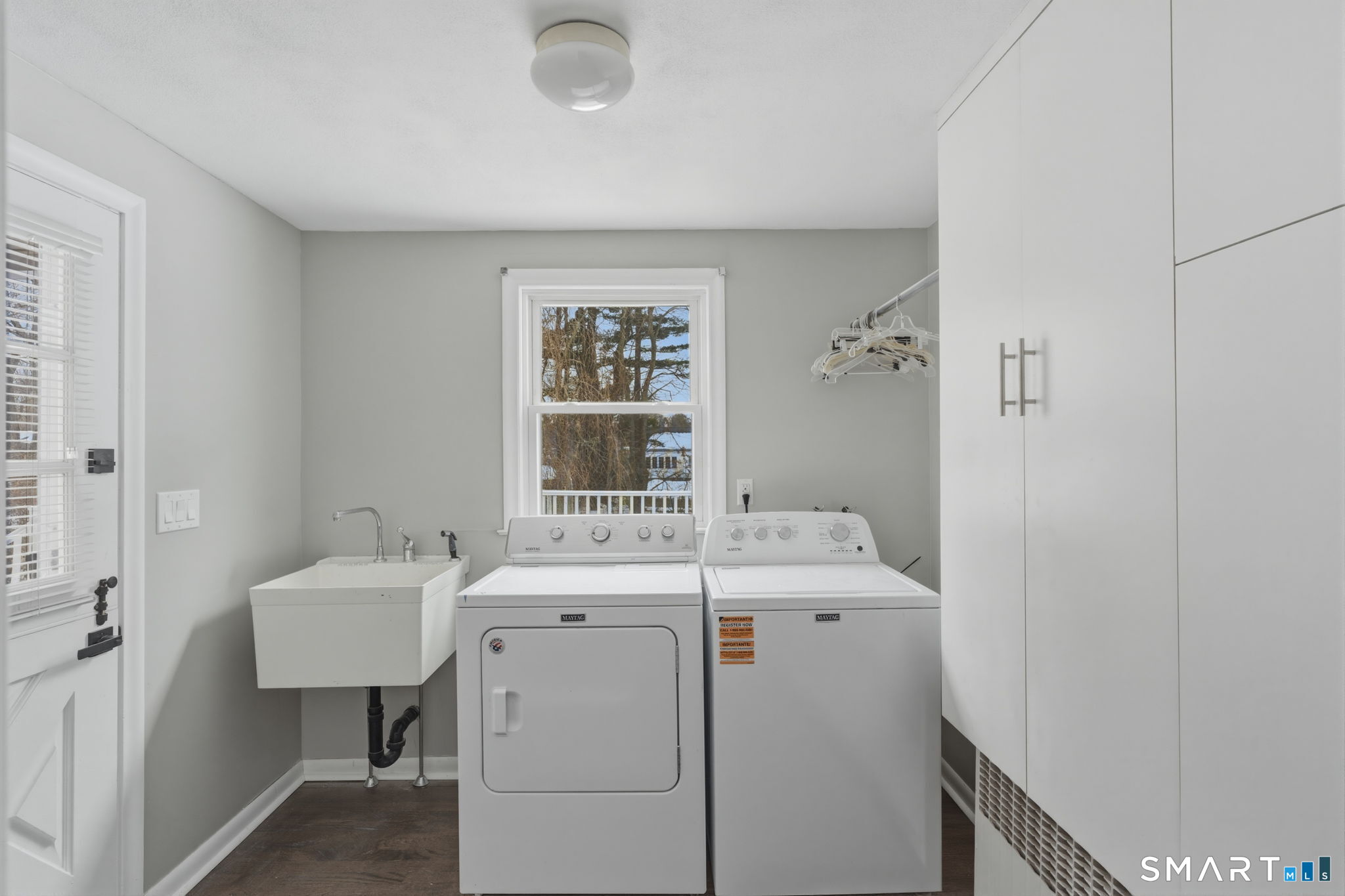 35 West Ridge Drive West Hartford, CT 06117 - Photo 34 of 38 a utility room with dryer and washer