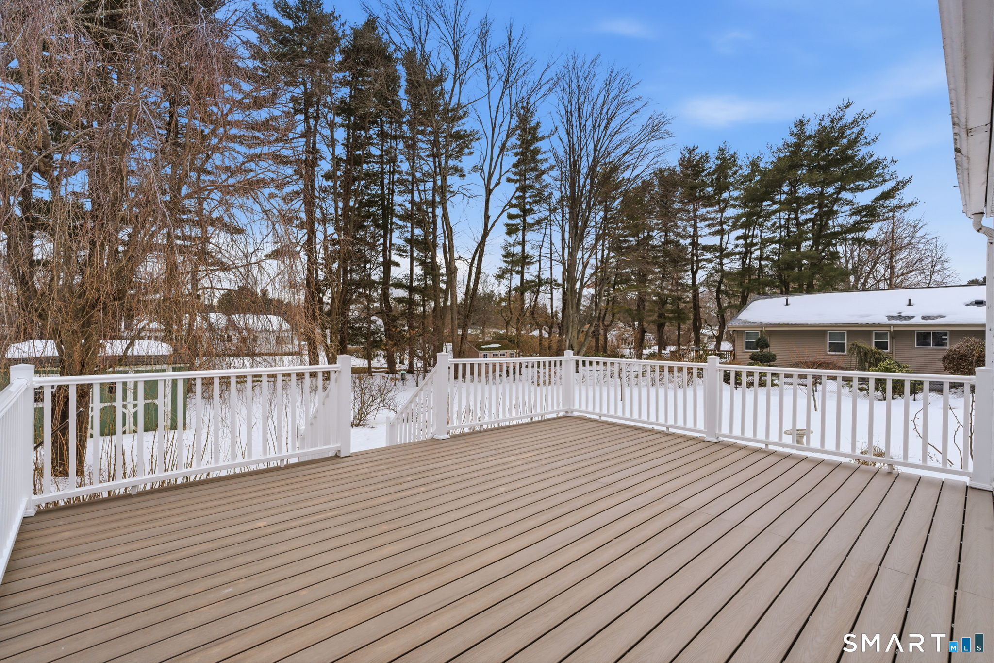 35 West Ridge Drive West Hartford, CT 06117 - Photo 4 of 38 a view of a wooden roof deck