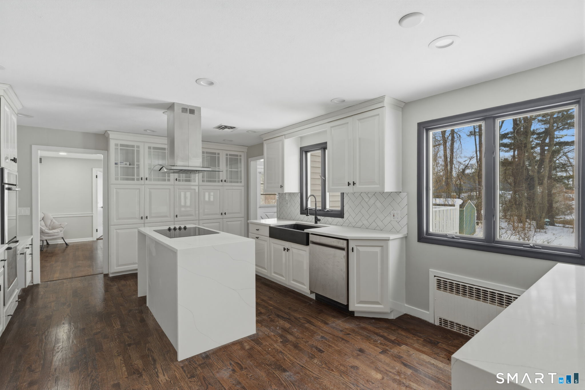 35 West Ridge Drive West Hartford, CT 06117 - Photo 6 of 38 a kitchen with a stove a sink and a refrigerator